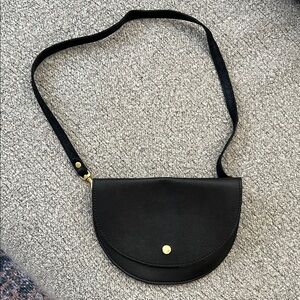Elegant Black Crossbody Bag with Gold Detail